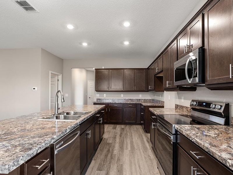 A wide selection of options are available to personalize your dream kitchen - Monroe 55+ by Highland Homes