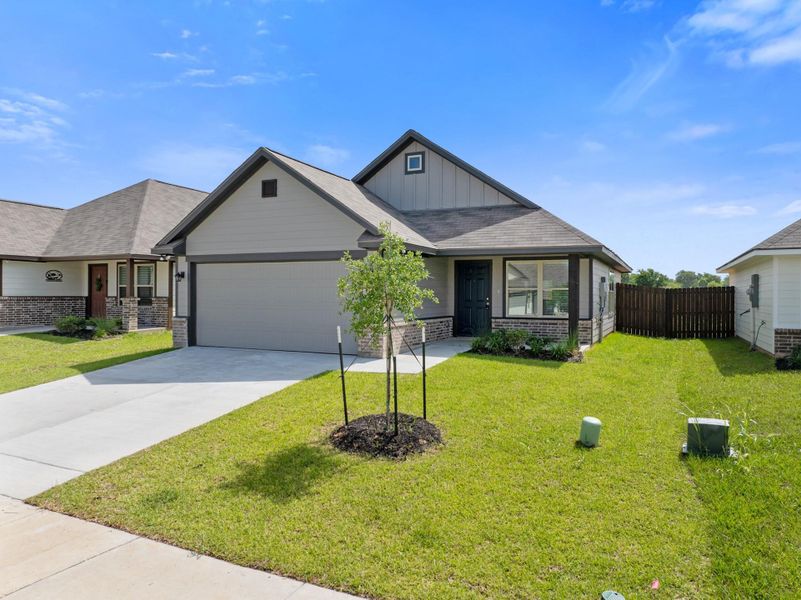 Front exterior of a new home in , Bryan, TX, highlighting curb appeal (Image 20). Front exterior of a new home in , Bryan, TX, highlighting curb appeal (Image 20).
