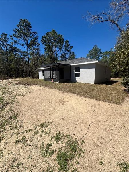 Exterior details and patio area of a home in , Citrus Springs (Image 27).