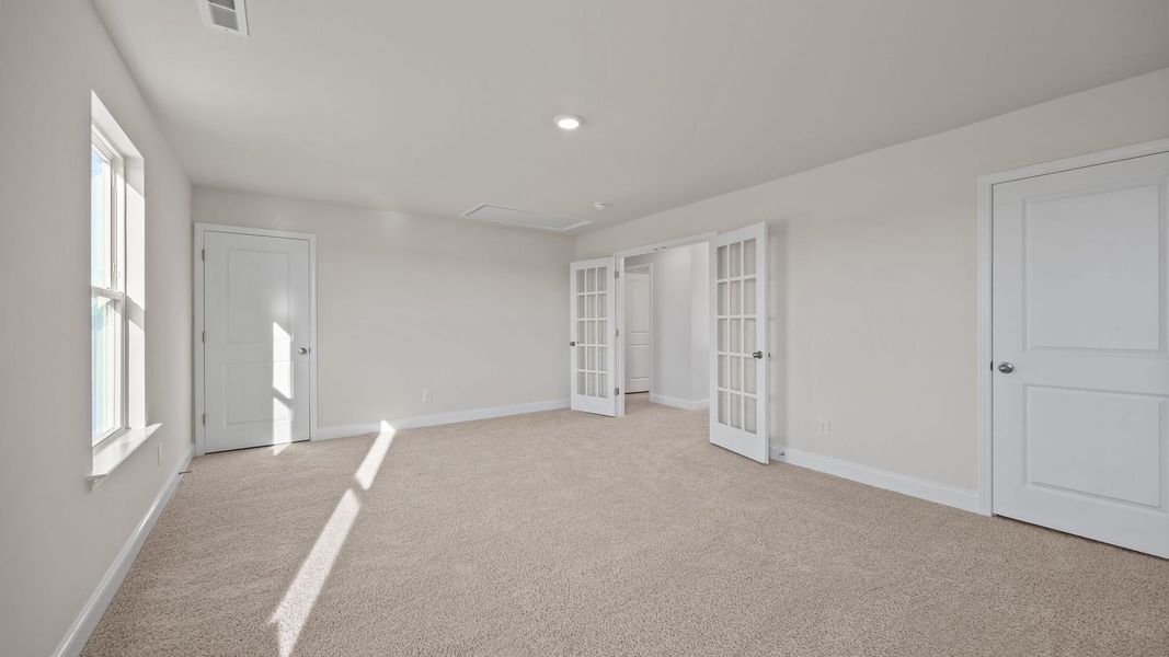 Spacious, unfurnished interior of a new home in Beaver Dam Crossing, Bailey (Image 34). Spacious, unfurnished interior of a new home in Beaver Dam Crossing, Bailey (Image 34).
