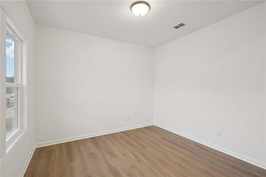 Spacious, unfurnished interior of a new home in Eastlyn Crossing, Flowery Branch (Image 25). Spacious, unfurnished interior of a new home in Eastlyn Crossing, Flowery Branch (Image 25).