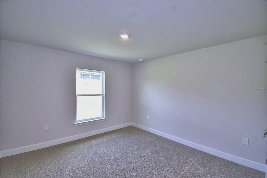Spacious, unfurnished interior of a new home in Lake Juliana Estates, Auburndale (Image 29).