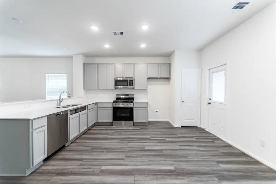 Furnished interior view inside a new home in Windrose Green, Angleton (Image 7).