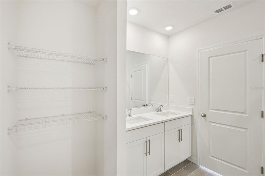 Furnished interior view inside a new home in The Grove at Stuart Crossing - Classic Series, Bartow (Image 7).