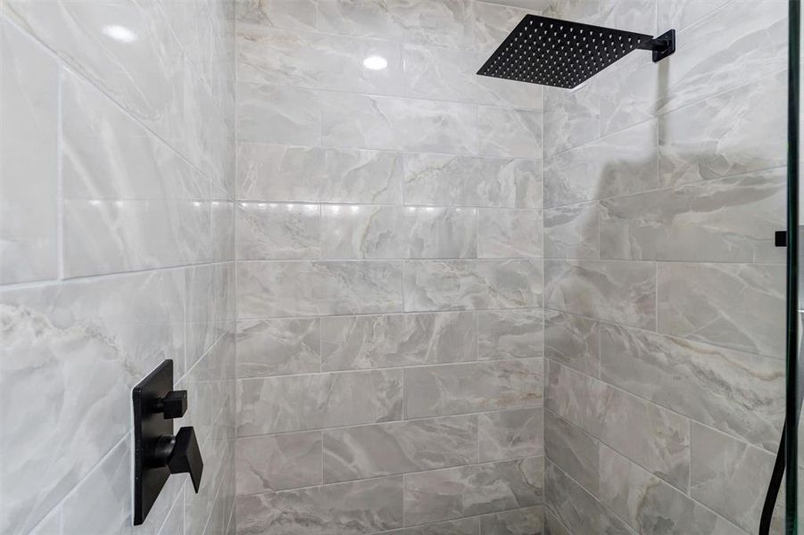 Bathroom view of tiled shower