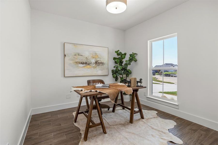 Office space featuring hardwood / wood-style flooring