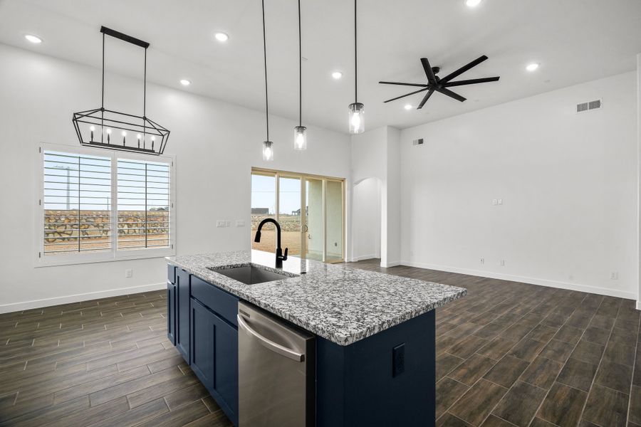 Representative furnished interior of a home built from the Scottsdale by LEH. Homes in Verdancia, El Paso (Image 16).