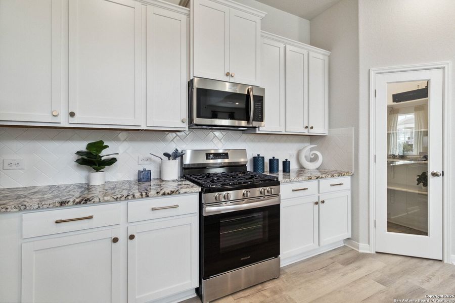 Furnished interior view inside a new home in Katzer Ranch, Converse (Image 9). Furnished interior view inside a new home in Katzer Ranch, Converse (Image 9).