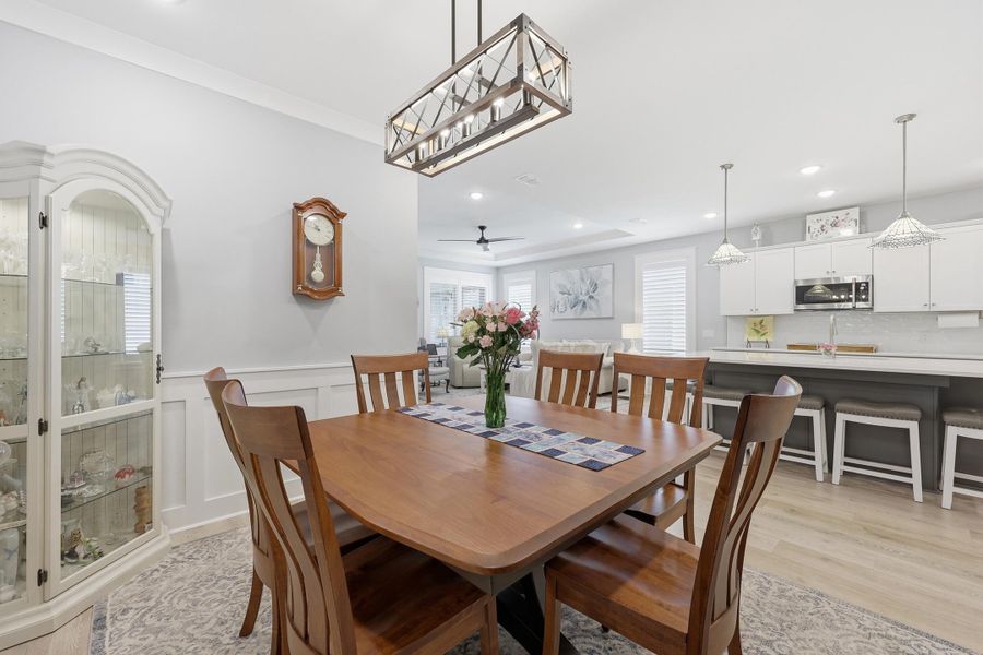 Furnished interior view inside a new home in K. Hovnanian's® Four Seasons at Lakes of Cane Bay, Summerville (Image 5).