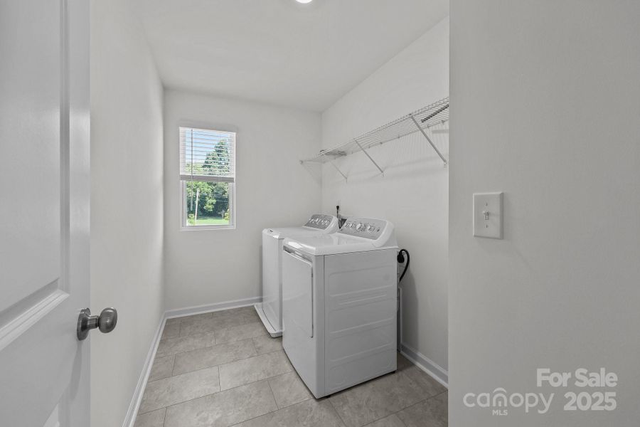 Furnished interior view inside a new home in Piper Landing, Concord (Image 11).