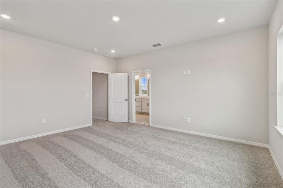 Spacious, unfurnished interior of a new home in Laureate Park at Lake Nona - Garden Series, Orlando (Image 25).