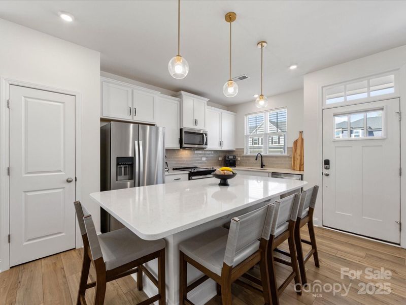 Furnished interior view inside a new home in Smith Farm, Belmont (Image 8).