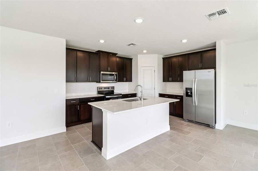Furnished interior view inside a new home in The Reserve at Hammock Oaks - Classic Series, Lady Lake (Image 5).