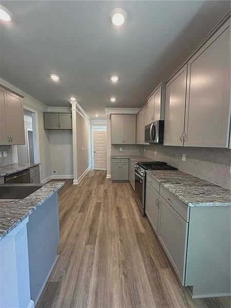 Furnished interior view inside a new home in Mirror Lake at South Harbour, Villa Rica (Image 9).