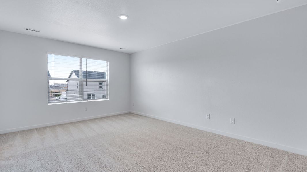 Spacious, unfurnished interior of a new home in Trails at Crowfoot, Parker (Image 19).