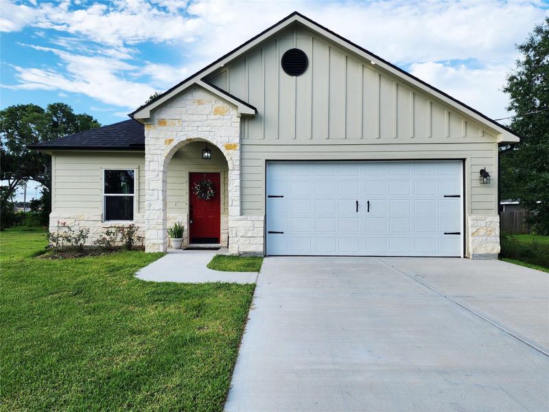Front exterior of a new home in , West Columbia, TX, highlighting curb appeal (Image 12).