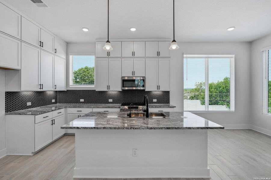 Furnished interior view inside a new home in Rose Hill, San Antonio (Image 6).