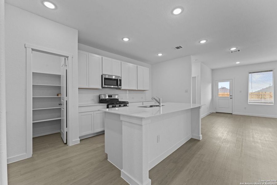 Furnished interior view inside a new home in Voss Farms, New Braunfels (Image 12).