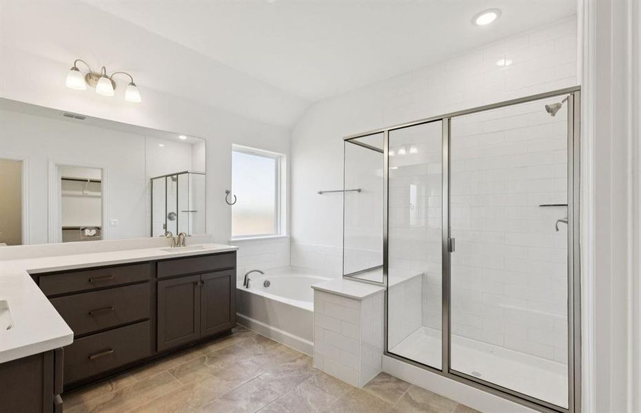 Luxurious owner's bath complete with double sinks and a generous shower *Real home pictured Luxurious owner's bath complete with double sinks and a generous shower *Real home pictured