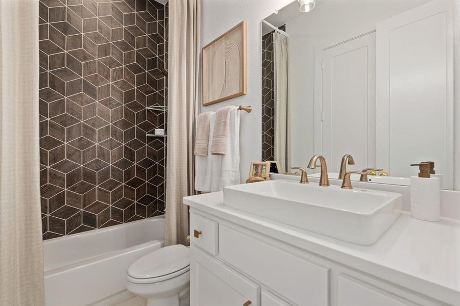 Bathroom with shower / bathtub combination with curtain and vanity Bathroom with shower / bathtub combination with curtain and vanity