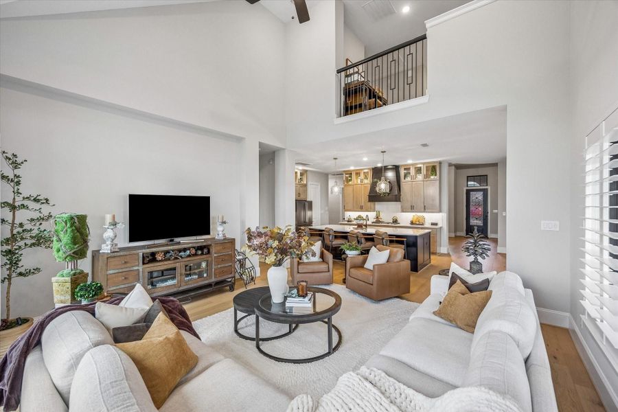 Engineered hardwood floors flow throughout the downstairs living spaces.