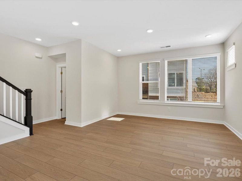 Spacious, unfurnished interior of a new home in Central Living at Craig, Charlotte (Image 17).