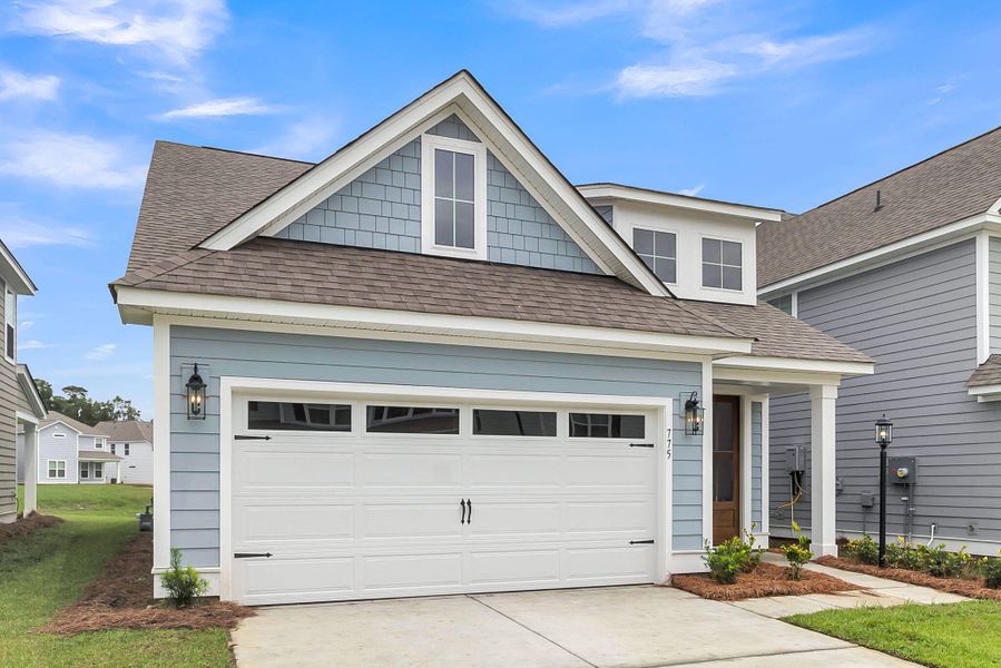 Front exterior of a new home in High Point at Foxbank, Moncks Corner, SC, highlighting curb appeal (Image 32).