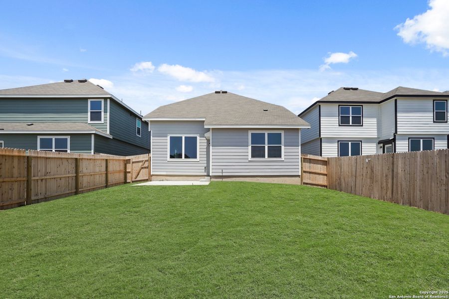 Front exterior of a new home in Abbott Place, St. Hedwig, TX, highlighting curb appeal (Image 17). Front exterior of a new home in Abbott Place, St. Hedwig, TX, highlighting curb appeal (Image 17).