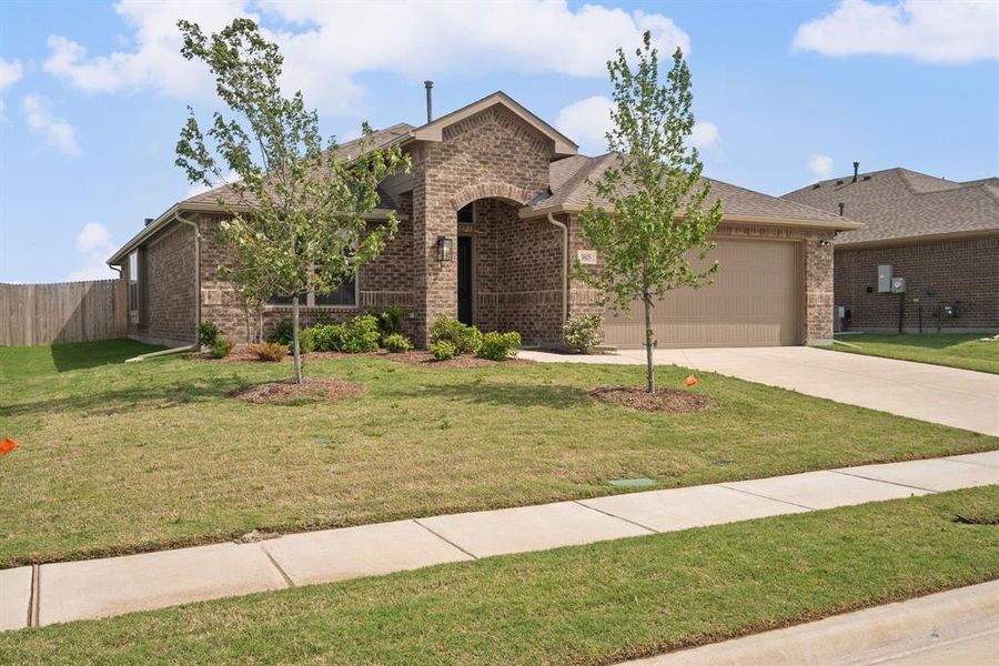 Front exterior of a new home in Fox Landing, Caddo Mills, TX, highlighting curb appeal (Image 27).