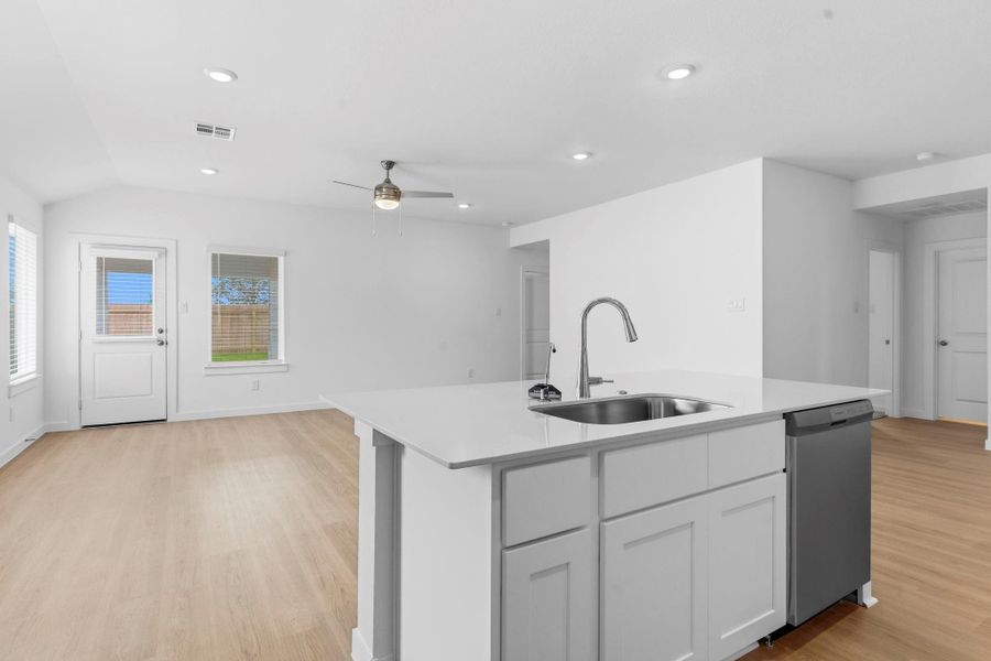 Furnished interior view inside a new home in Caldwell Crossing, Iowa Colony (Image 13).