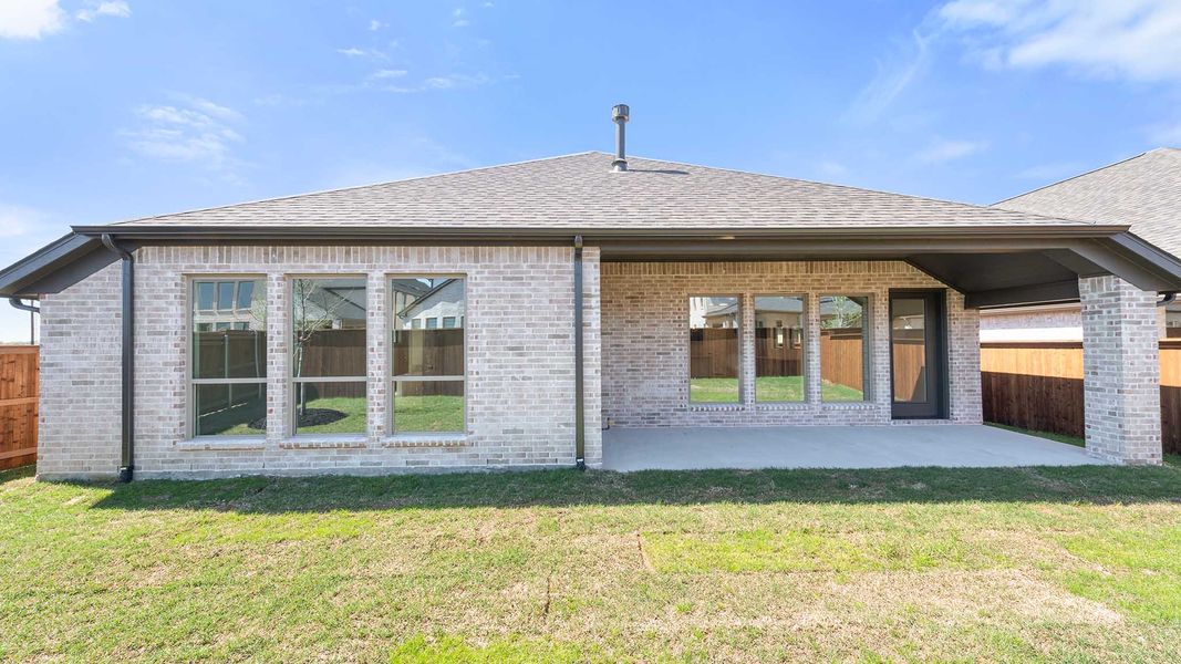 Exterior details and patio area of a home in Cambridge Crossing, Celina (Image 4).
