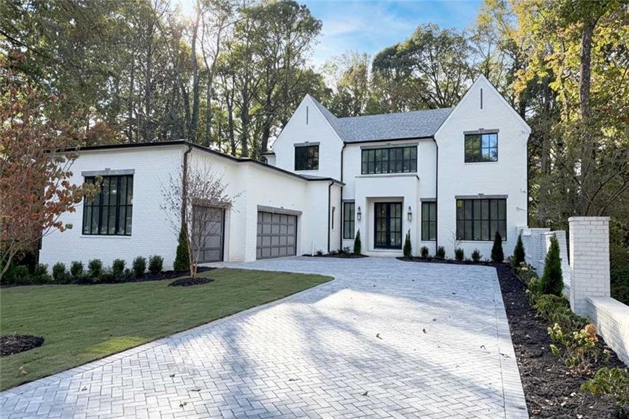 Front exterior of a new home in , Alpharetta, GA, highlighting curb appeal (Image 1).