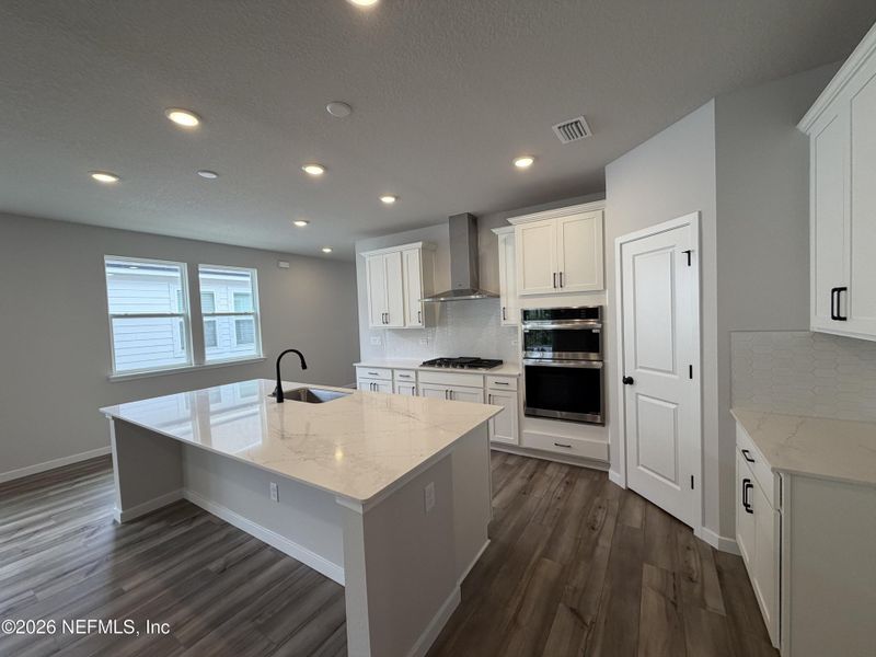 Furnished interior view inside a new home in Reserve East, Flagler Beach (Image 13).