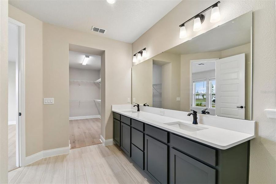 Furnished interior view inside a new home in Weslyn Park in Sunbridge 34', St. Cloud (Image 10).