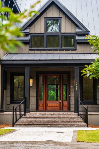 Front exterior of a new home in , Johns Island, SC, highlighting curb appeal (Image 32).