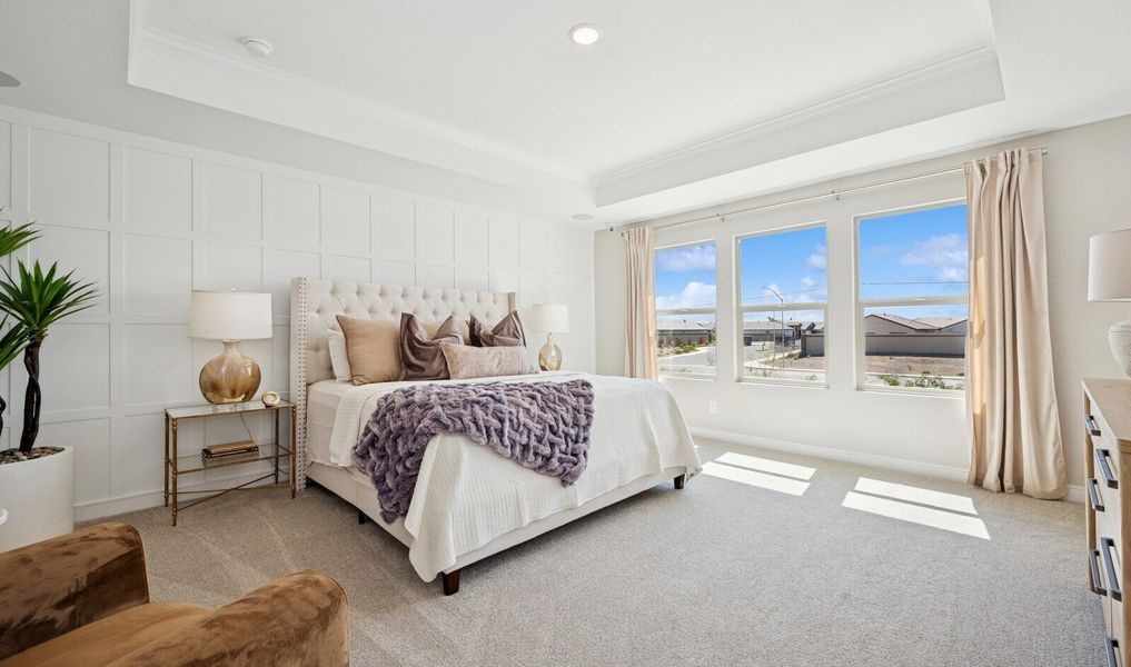 Primary suite with decorative feature wall