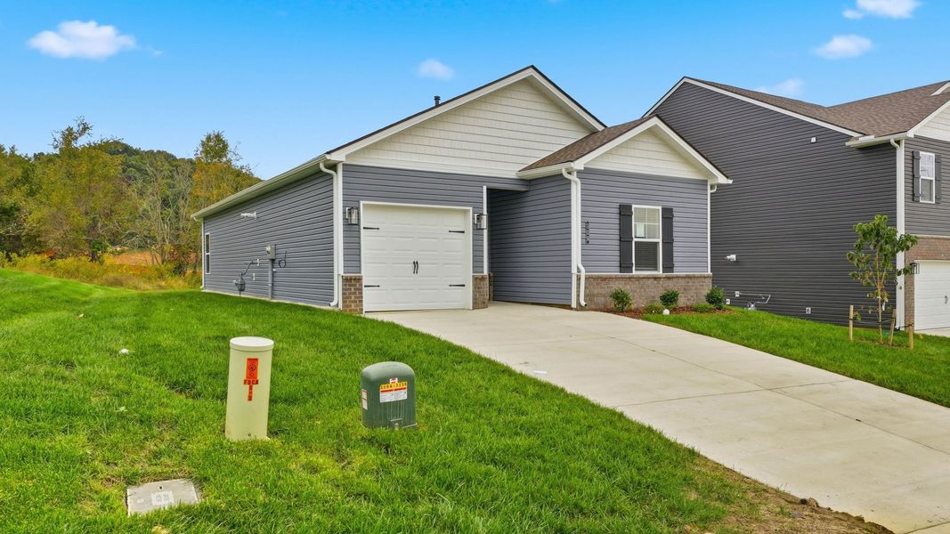 Front exterior of a new home in Fieldcrest Acres, Blountville, TN, highlighting curb appeal (Image 2). Front exterior of a new home in Fieldcrest Acres, Blountville, TN, highlighting curb appeal (Image 2).