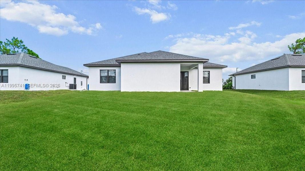 Exterior details and patio area of a home in , Lehigh Acres (Image 31). Exterior details and patio area of a home in , Lehigh Acres (Image 31).