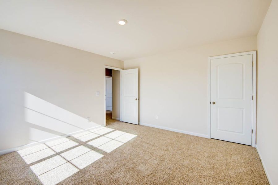 Representative unfurnished interior of a home built from the Penwell by D.R. Horton in Carter Ridge, Greenville (Image 43).