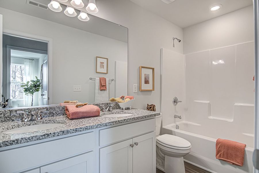 Representative furnished interior of a home built from the Russell - Genesis Value Collection by Mungo Homes in Avenue One, Castle Hayne (Image 10).