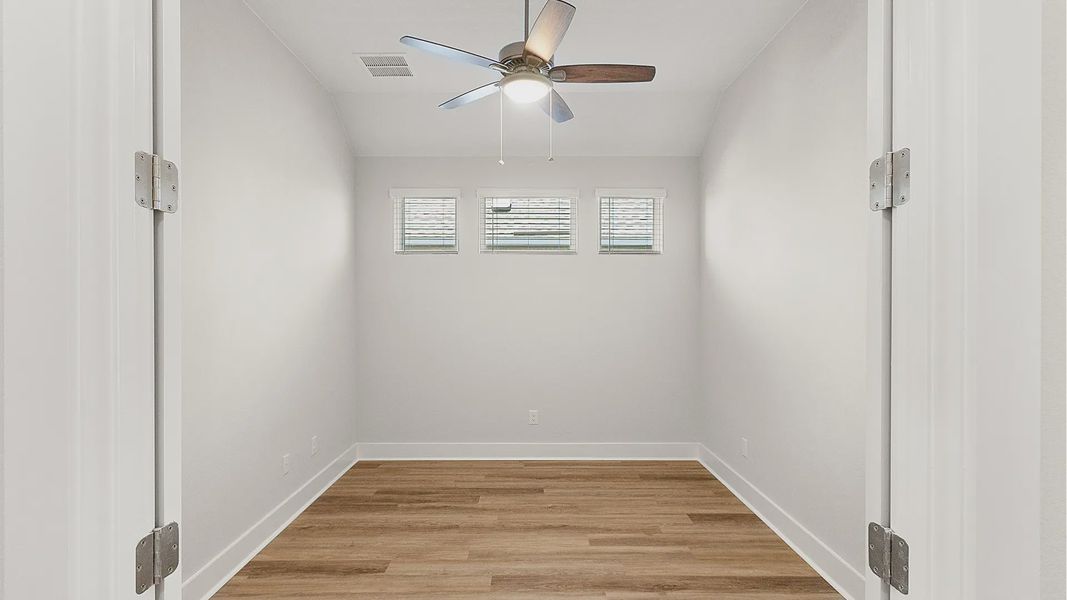 Representative unfurnished interior of a home built from the Brenner by Chesmar Homes in Newhaven, Manor (Image 27).