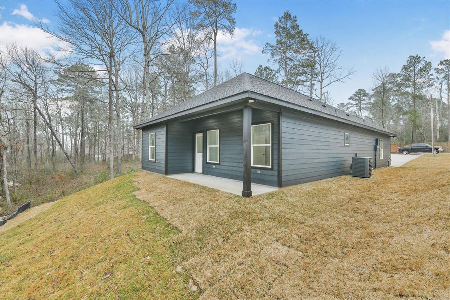 Exterior details and patio area of a home in , Willis (Image 27).