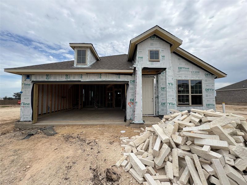 Front exterior of a new home in Berry Creek Highlands, Georgetown, TX, highlighting curb appeal (Image 2).