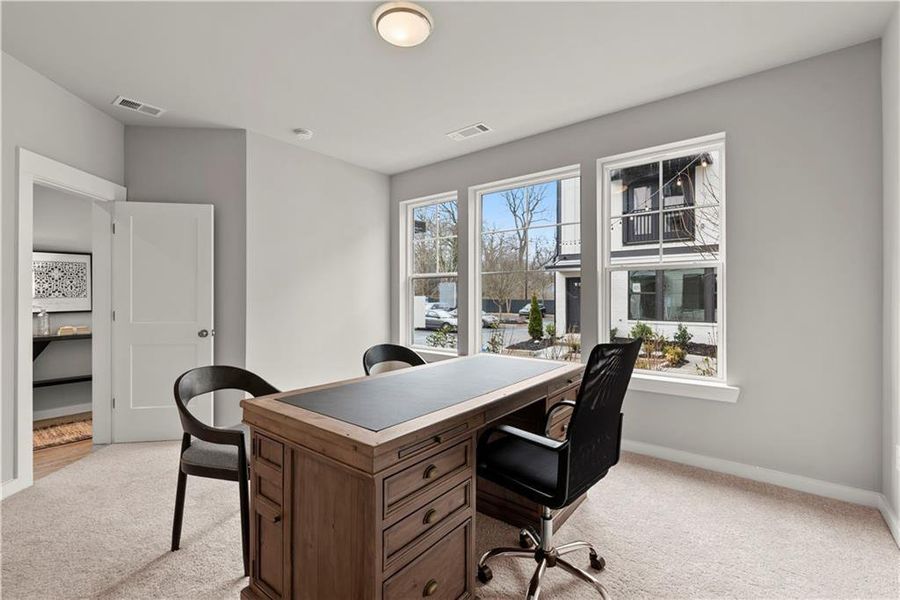 Furnished interior view inside a new home in One Riverside West, Atlanta (Image 3).