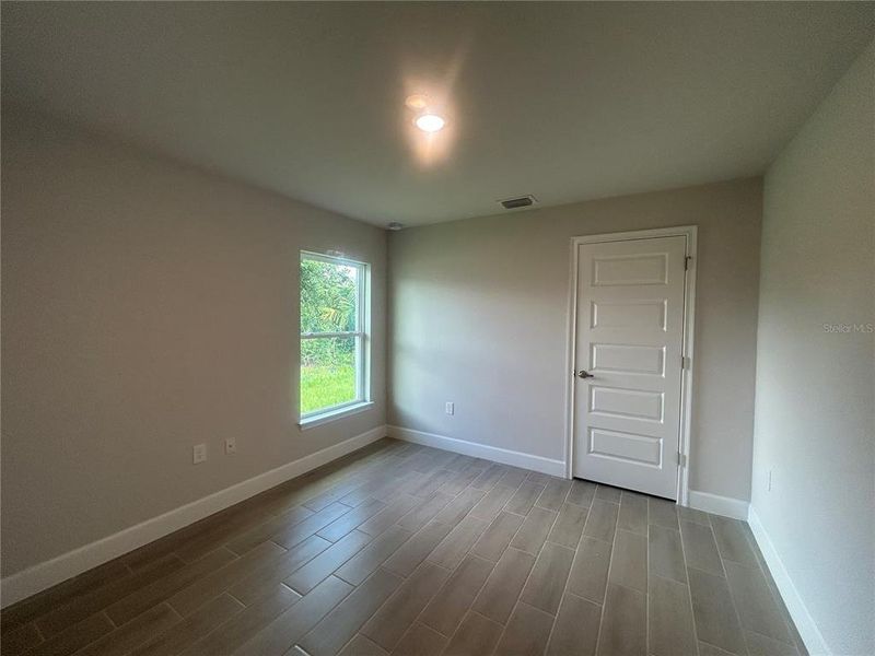 Spacious, unfurnished interior of a new home in Deep Creek, Punta Gorda (Image 21).