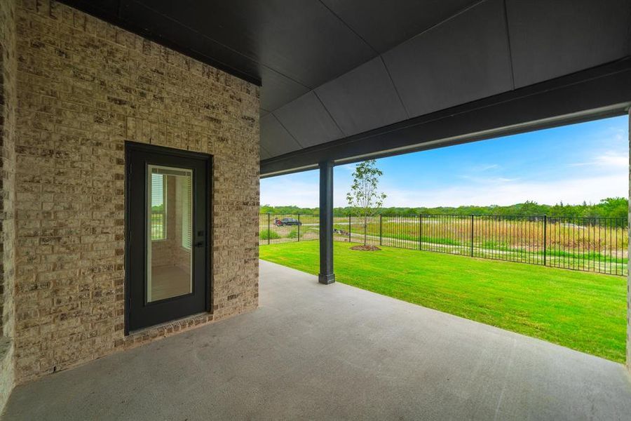 View of patio with a rural view