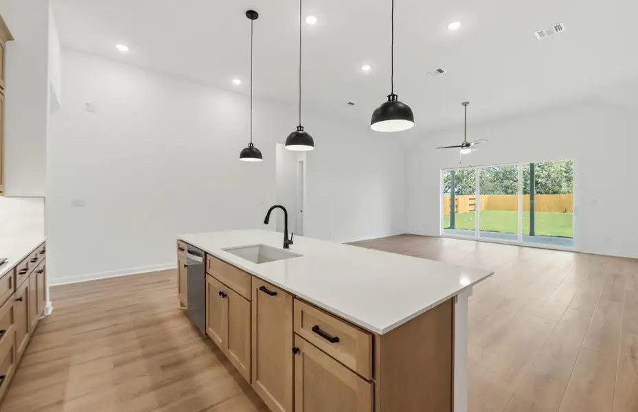 Furnished interior view inside a new home in 6 Creeks, Kyle (Image 8).