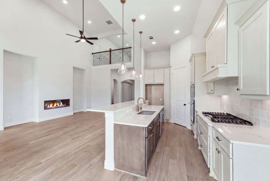 Furnished interior view inside a new home in Bridgeland 50′, Cypress (Image 9).