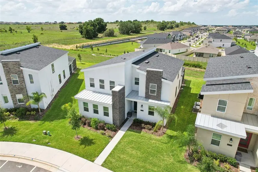 Front exterior of a new home in , Davenport, FL, highlighting curb appeal (Image 19).