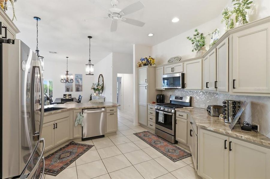 Furnished interior view inside a new home in , The Villages (Image 18).